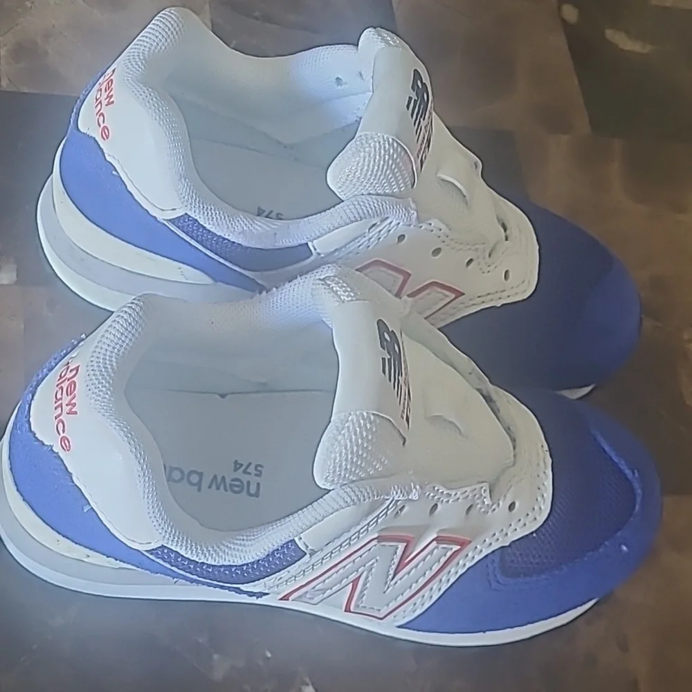New Balance 574 Kids Sneakers in Blue and White with Pink Accents, Size 11C